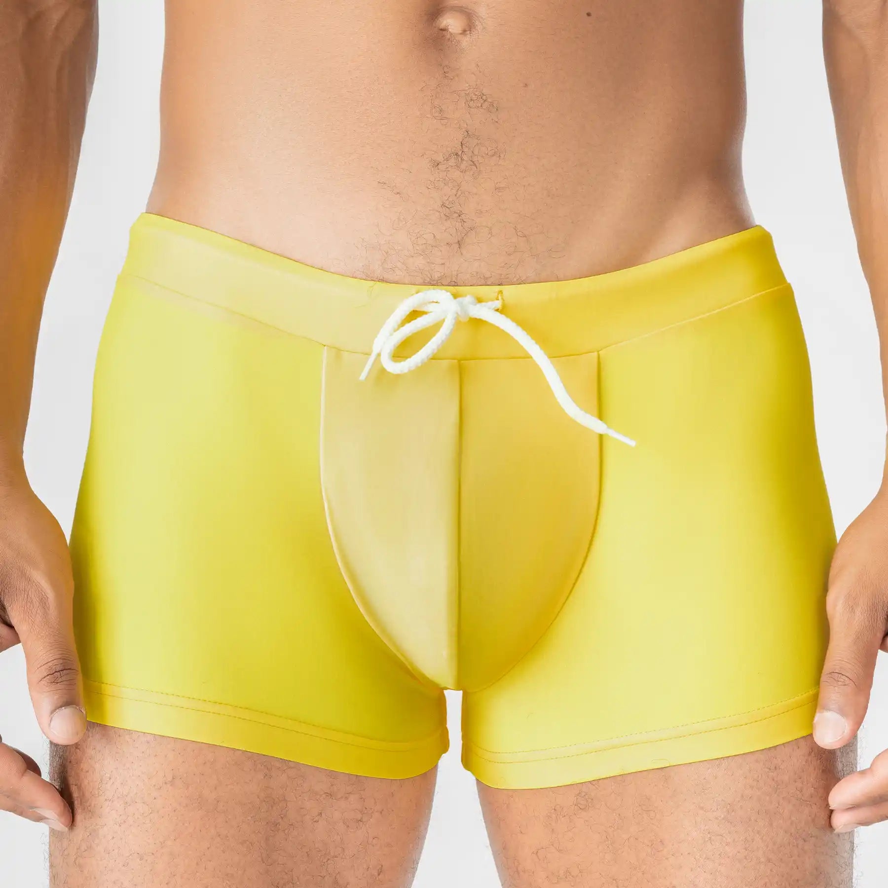 Anatomic Intimate 2.1 yellow men’s swim trunks, supportive pouch design, front view