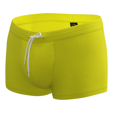 Anatomic Intimate 2.1 yellow men’s swim trunks with drawstring, anatomical fit, front view