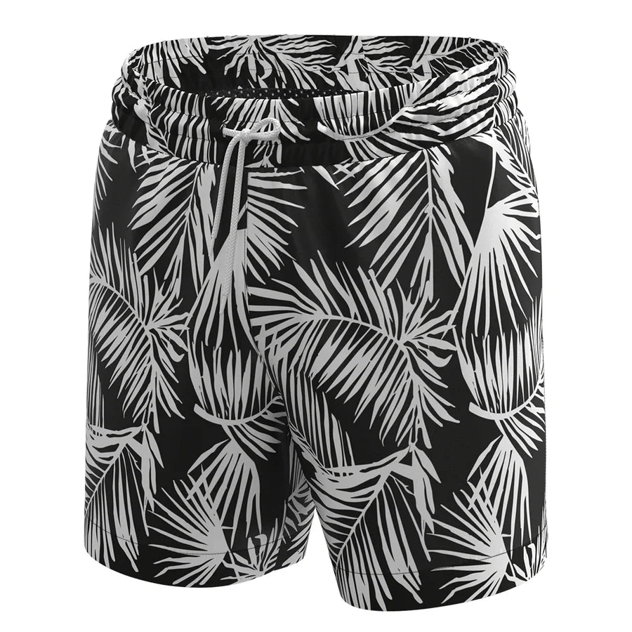 Man’s SET Anatomic Shorts 2.0 in black leaf print, men’s swim shorts with tropical design, front view